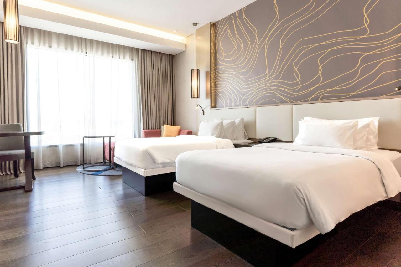 Radisson Collection Muscat, Hormuz Grand Hotel Bagian luar foto Deluxe Room